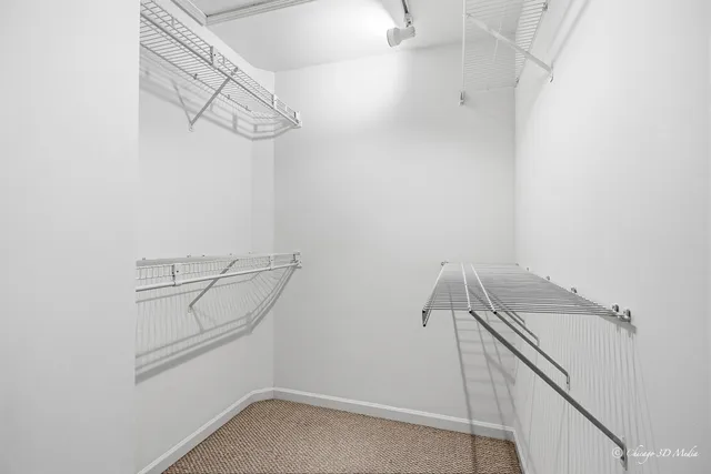 a view of a room with racks on the wall