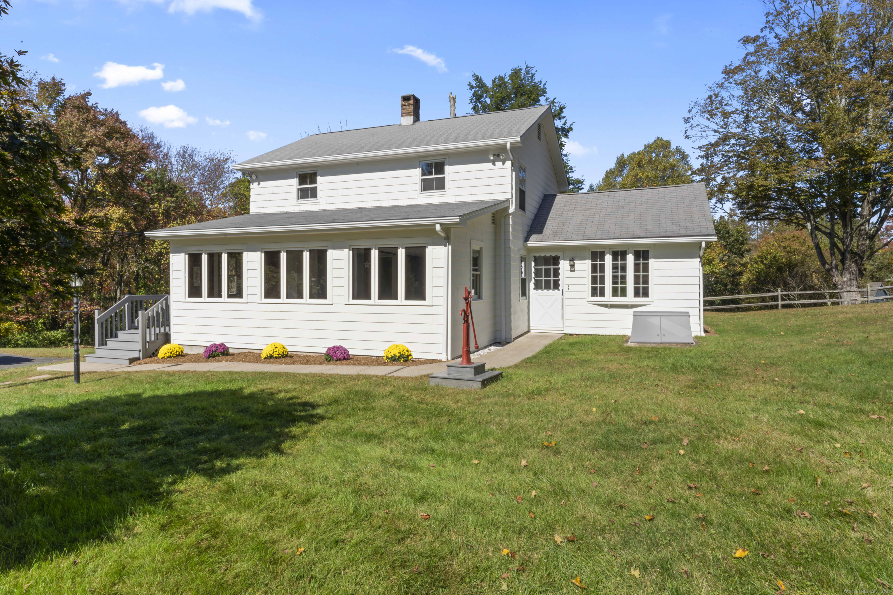 front view of a house with a yard