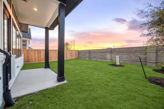 a view of a backyard with a garden