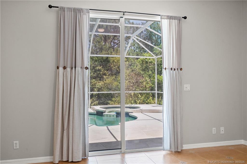 7221 Southeast Seagate Lane Stuart, FL 34997 - Photo 28 of 51 a view of a room with window