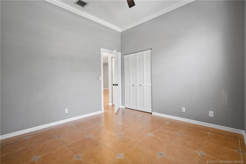 7221 Southeast Seagate Lane Stuart, FL 34997 - Photo 33 of 51 a view of an empty room