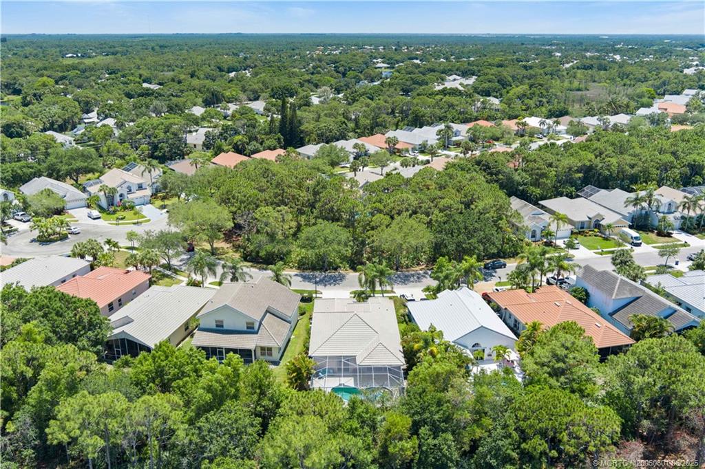 7221 Southeast Seagate Lane Stuart, FL 34997 - Photo 44 of 51 an aerial view of residential houses with outdoor space