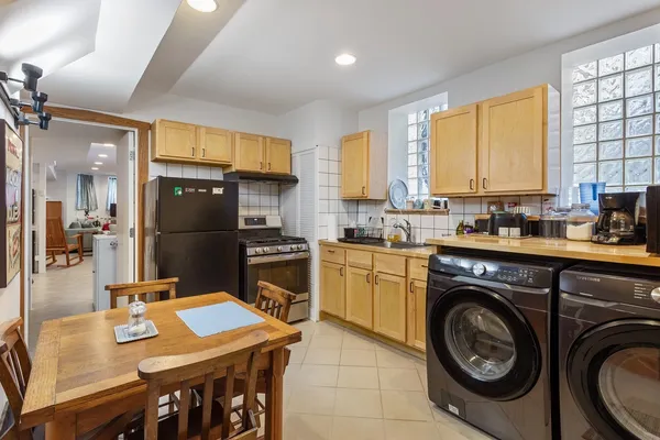 a picture of a wall with a white and white refrigerator
