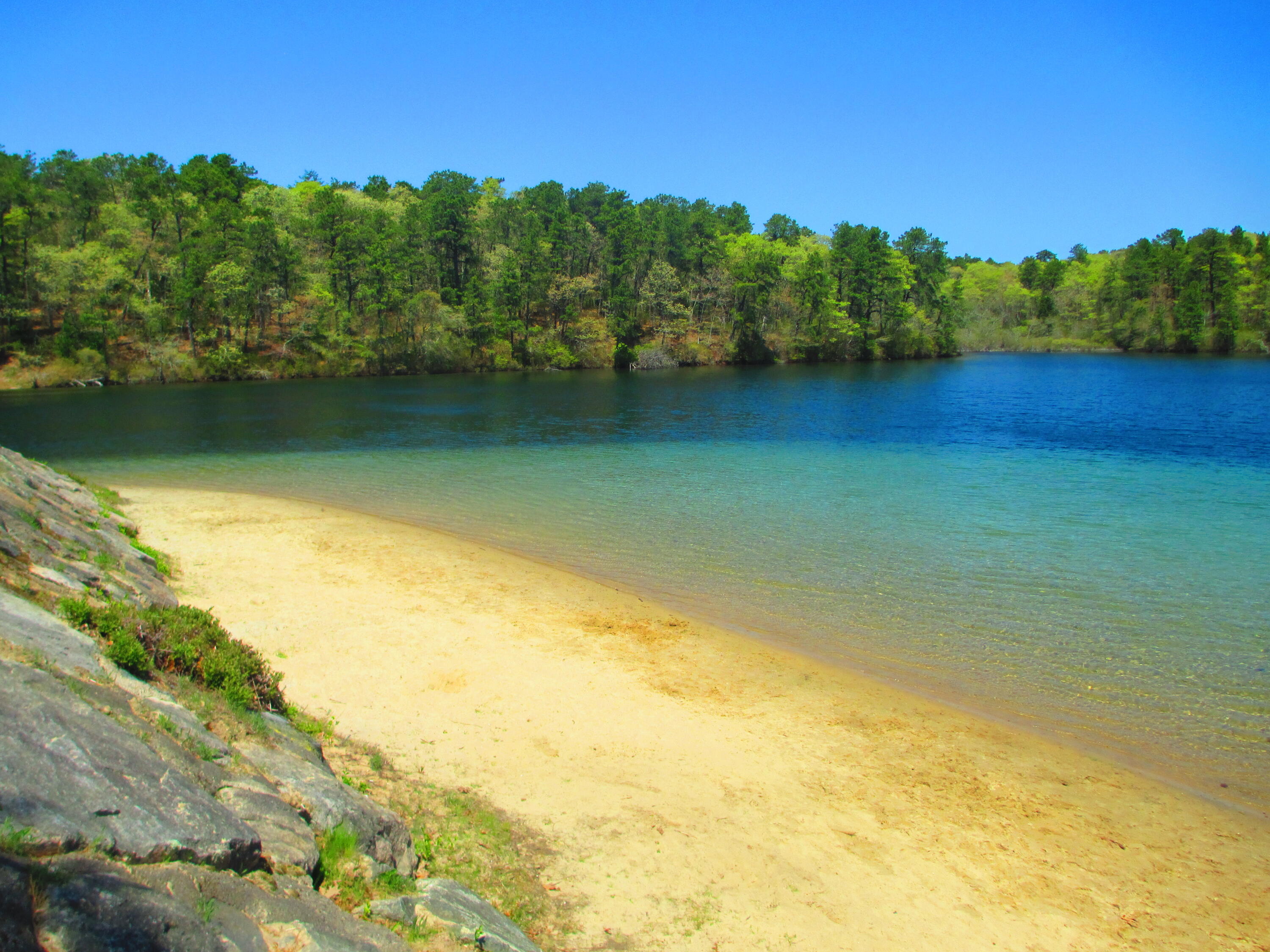 101 Oldham Road Osterville, MA 02655 - Photo 28 of 32 a view of a lake with a houses in the background