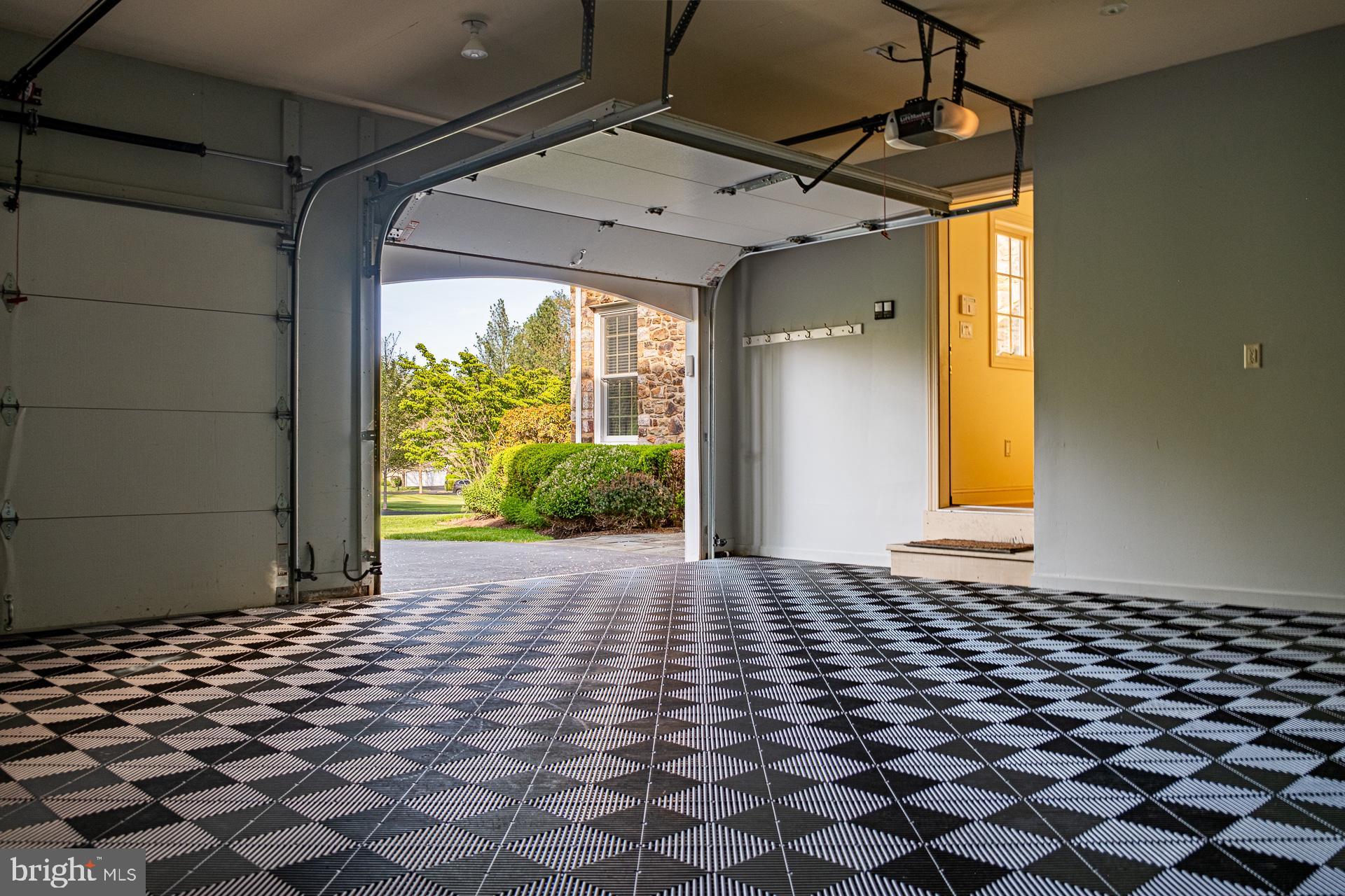 2 Garden Path, Unit 14 Doylestown, PA 18901 - Photo 32 of 36 Spacious garage with inviting entry.