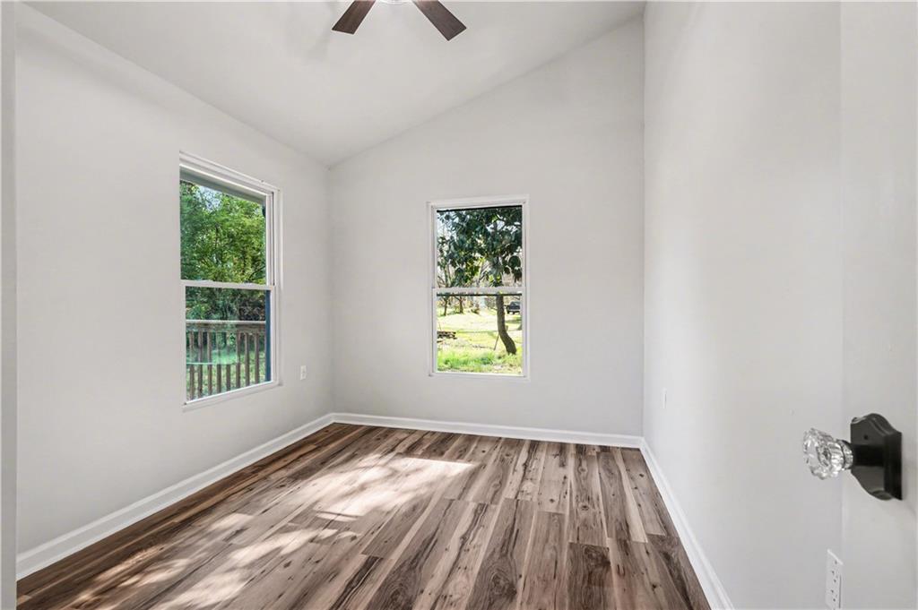 1004 Mapp Street Madison, GA 30650 - Photo 20 of 30 a view of an empty room and window