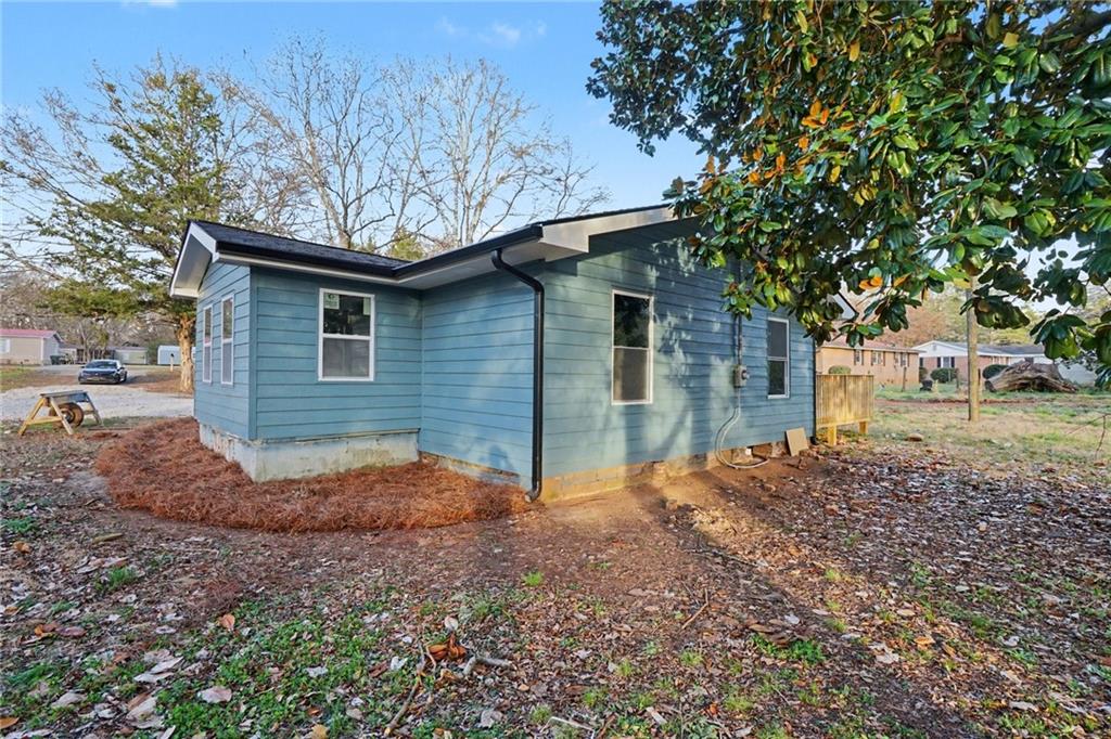 1004 Mapp Street Madison, GA 30650 - Photo 30 of 30 a view of a house with a yard