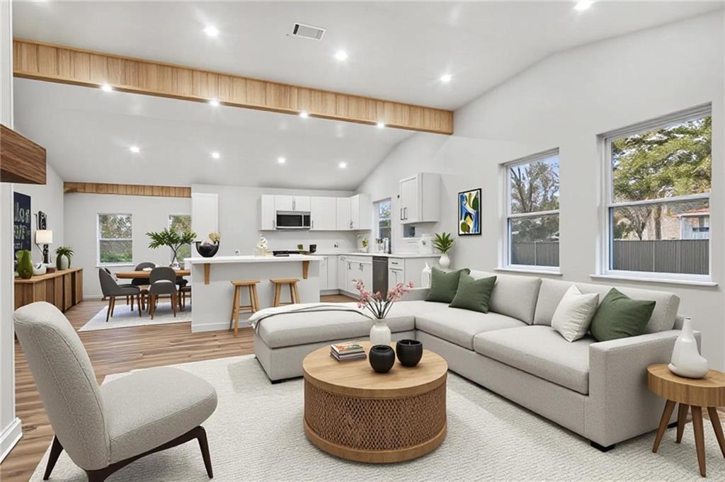 1004 Mapp Street Madison, GA 30650 - Photo 5 of 30 a living room with furniture and a large window