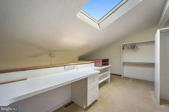 a utility room with cabinets