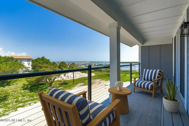 a view of kitchen with stainless steel appliances refrigerator oven microwave and stove