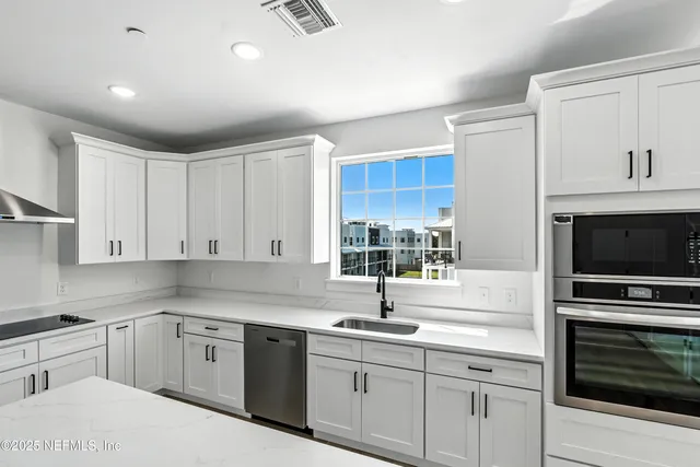 a bathroom with a toilet a sink and a mirror