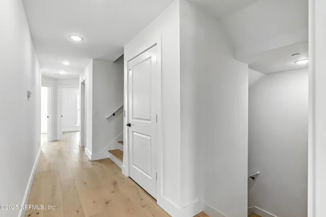 a bathroom with a shower and a sink