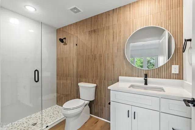 a view of a lake with a yard