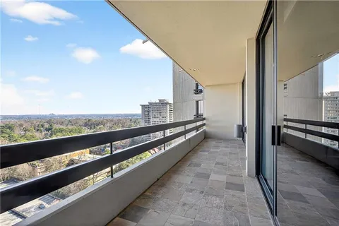 a view of city with a balcony