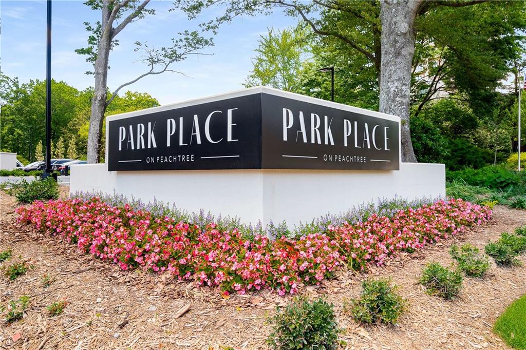 2660 Peachtree Road Northwest, Unit 19F Atlanta, GA 30305 - Photo 23 of 35 a view of a street with flower garden