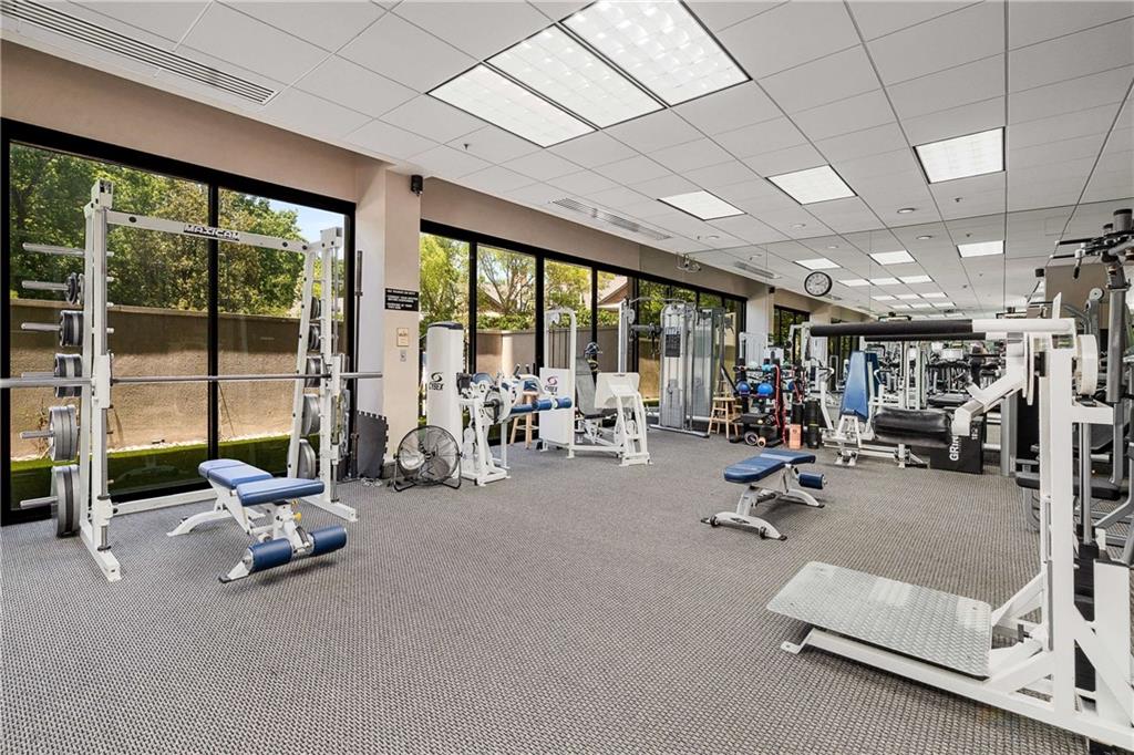 2660 Peachtree Road Northwest, Unit 19F Atlanta, GA 30305 - Photo 26 of 35 a view of a room with gym equipment