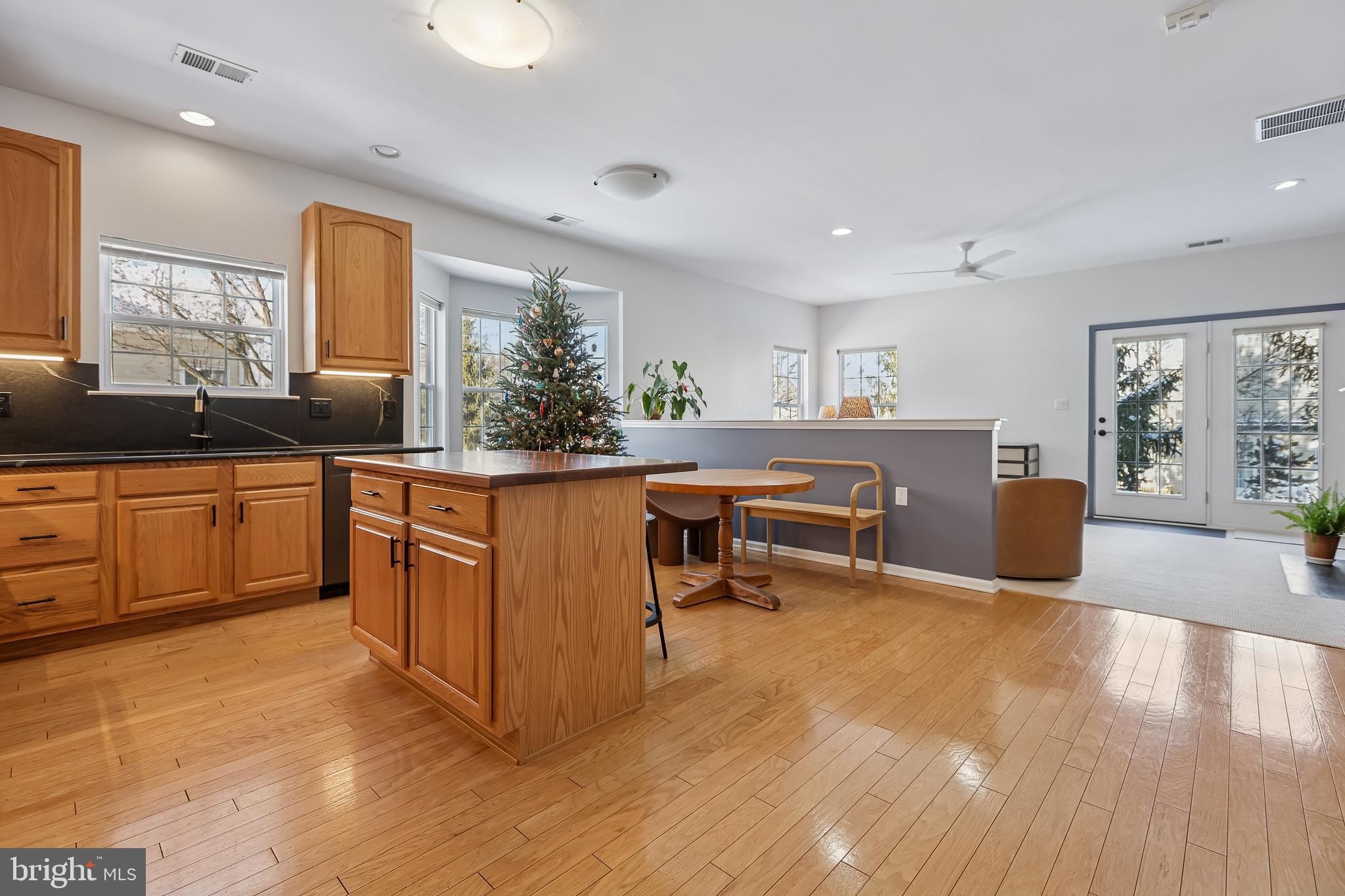 17 Pinflower Lane Princeton Junction, NJ 08550 - Photo 11 of 57 a kitchen with stainless steel appliances granite countertop a sink counter space and wooden floor