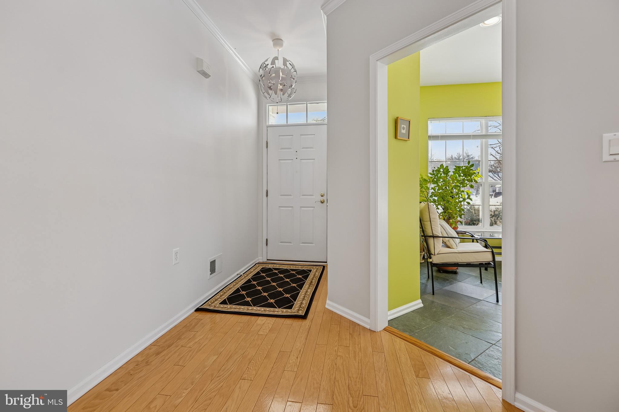 17 Pinflower Lane Princeton Junction, NJ 08550 - Photo 27 of 57 a view of a hallway view with wooden floor and a bedroom
