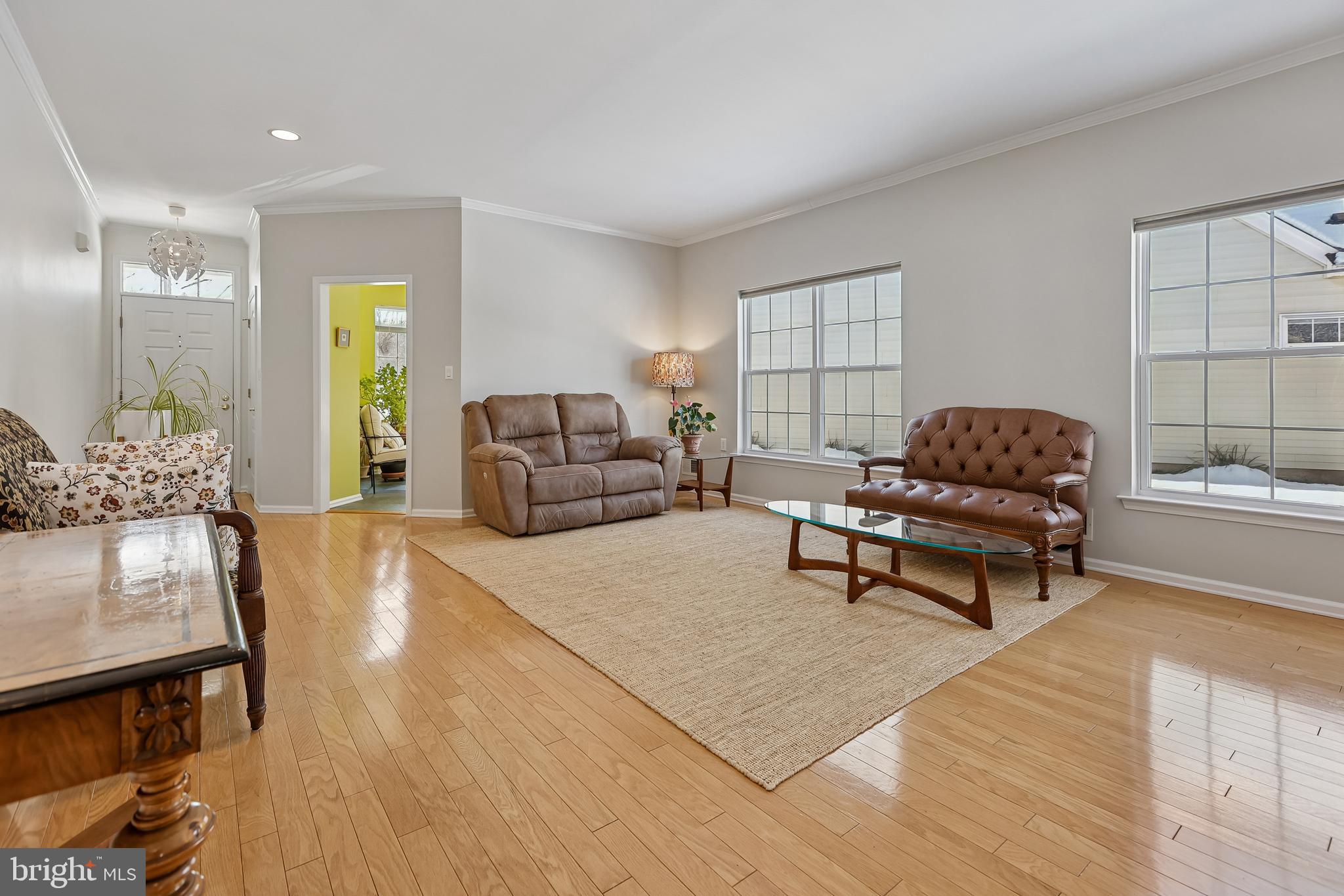 17 Pinflower Lane Princeton Junction, NJ 08550 - Photo 29 of 57 a living room with furniture and a wooden floor