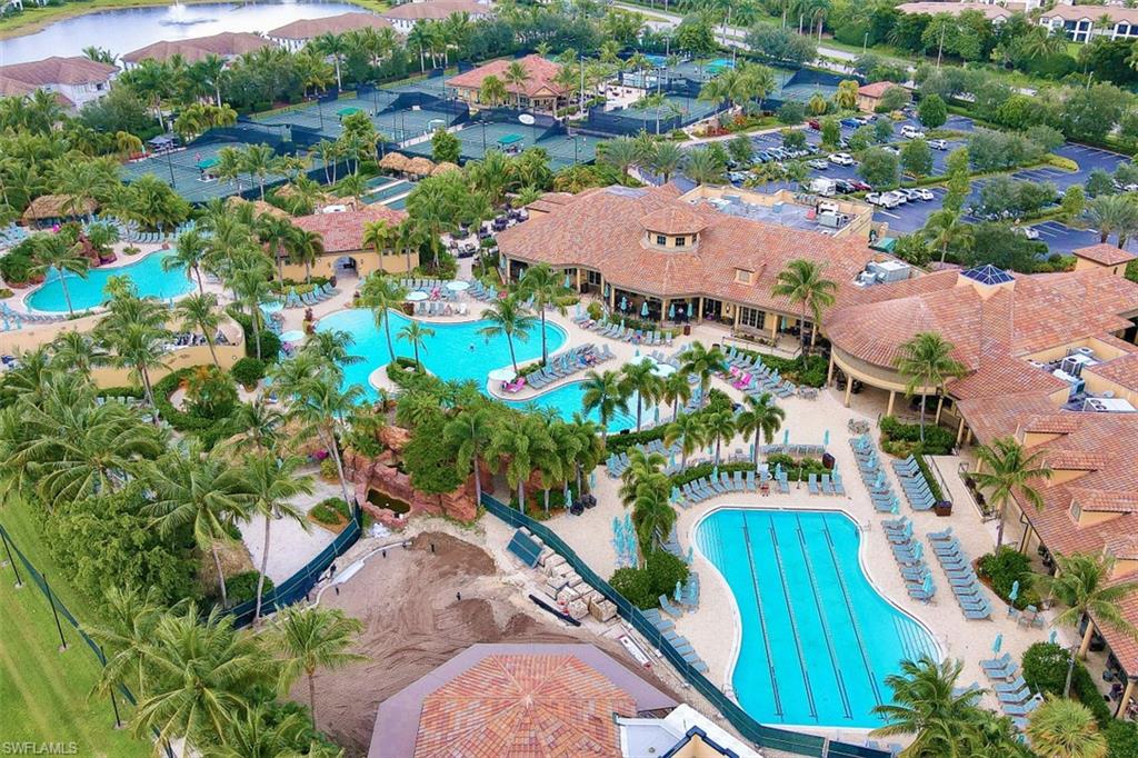 7688 Cottesmore Drive Naples, FL 34113 - Photo 42 of 45 an aerial view of residential houses with outdoor space and street view