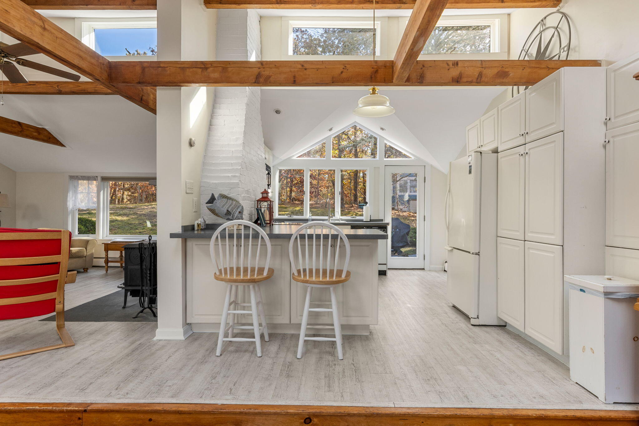 6 Cora Nickerson Road Harwich, MA 02645 - Photo 12 of 42 a view of a dining room with furniture window and wooden floor