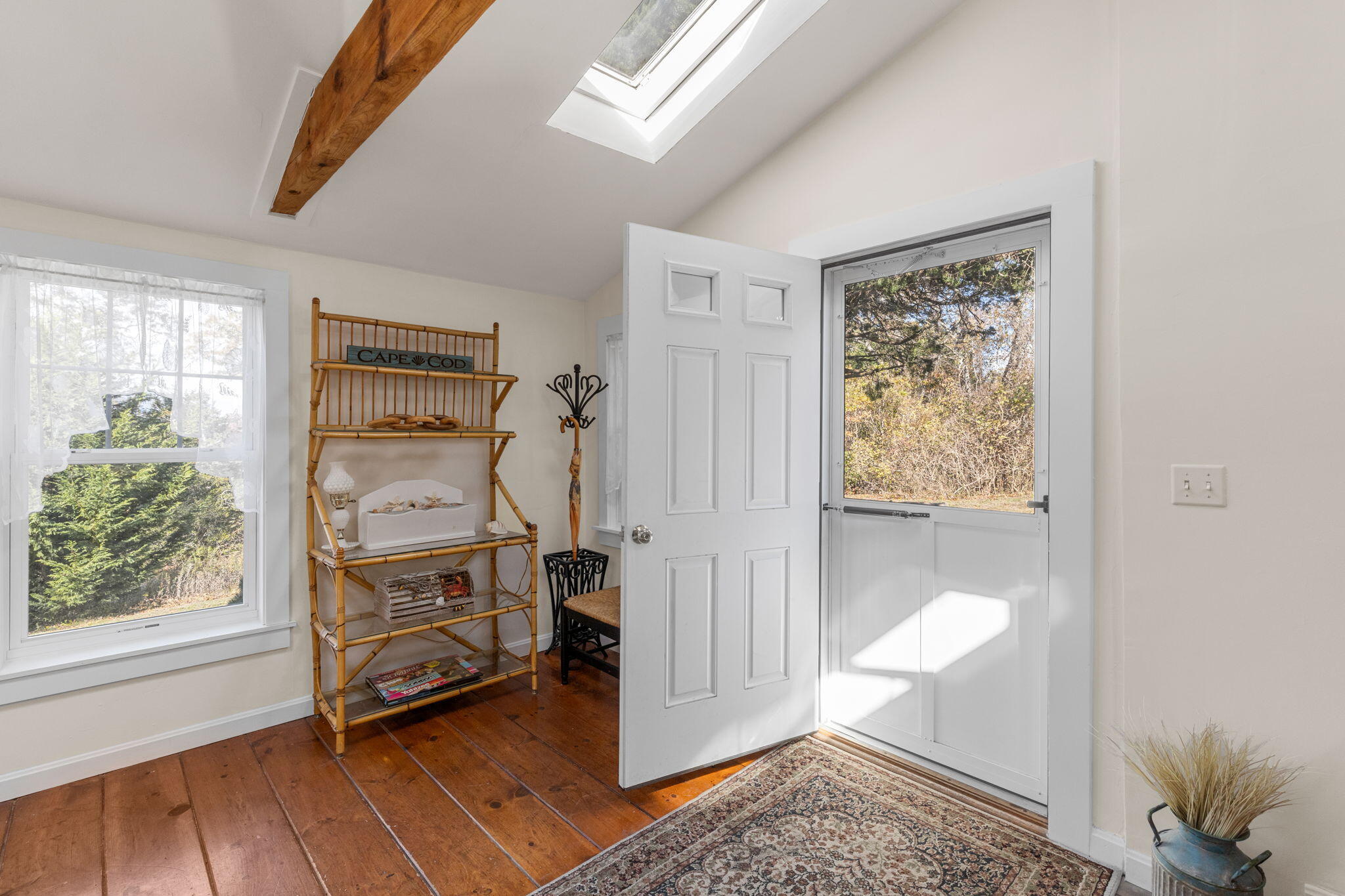 6 Cora Nickerson Road Harwich, MA 02645 - Photo 24 of 42 a view of a livingroom with furniture and a window