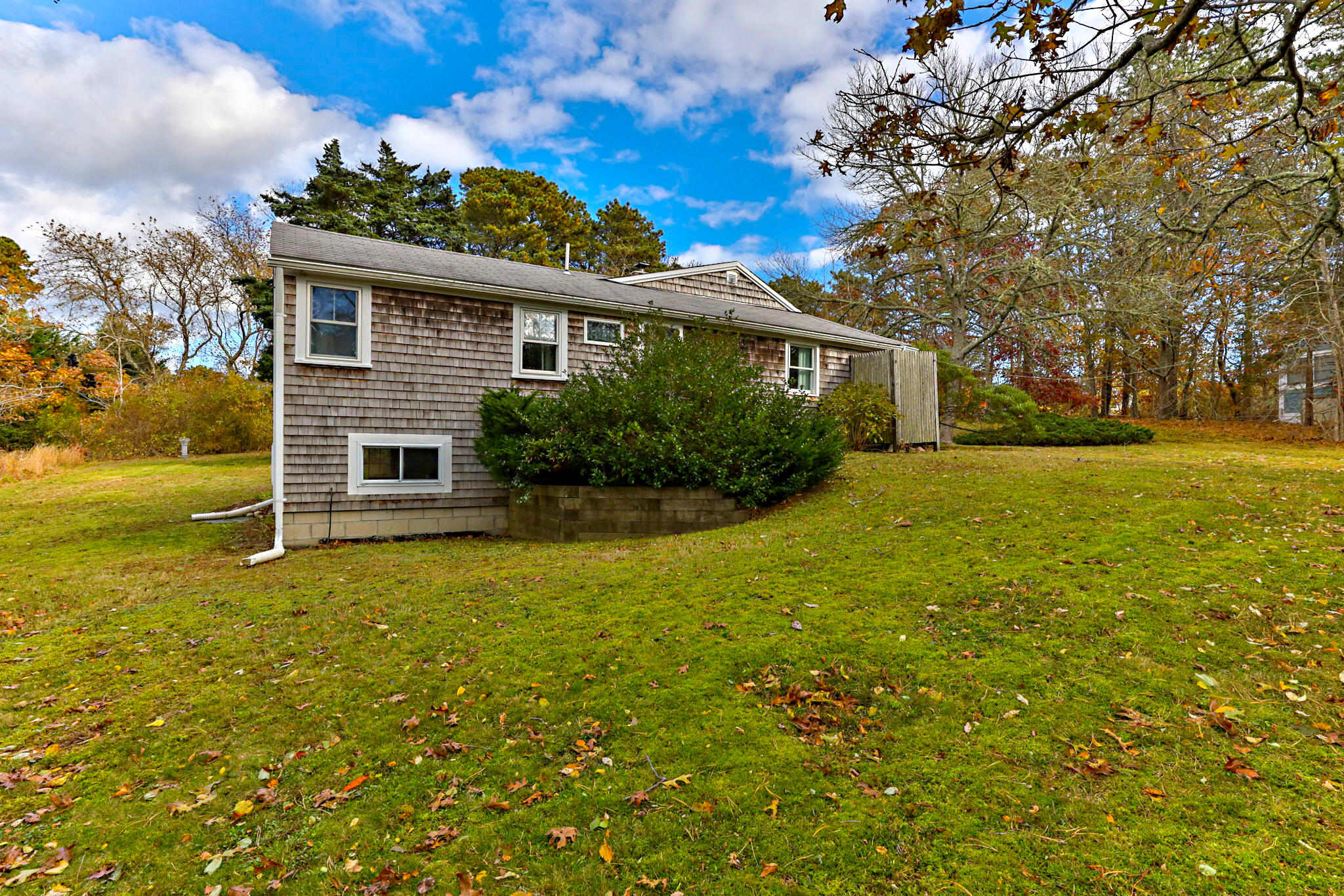 6 Cora Nickerson Road Harwich, MA 02645 - Photo 36 of 42 a view of a house with backyard and garden
