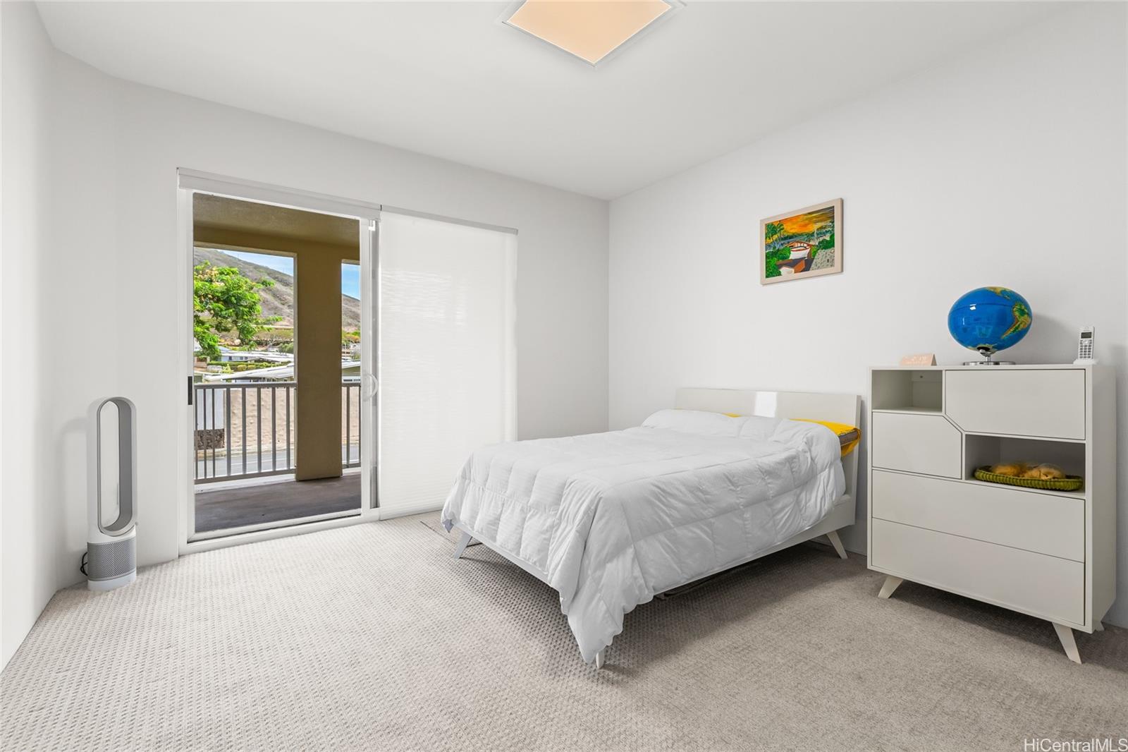 520 Lunalilo Home Road, Unit 8107 Honolulu, HI 96825 - Photo 11 of 25 a bedroom with a bed and a window