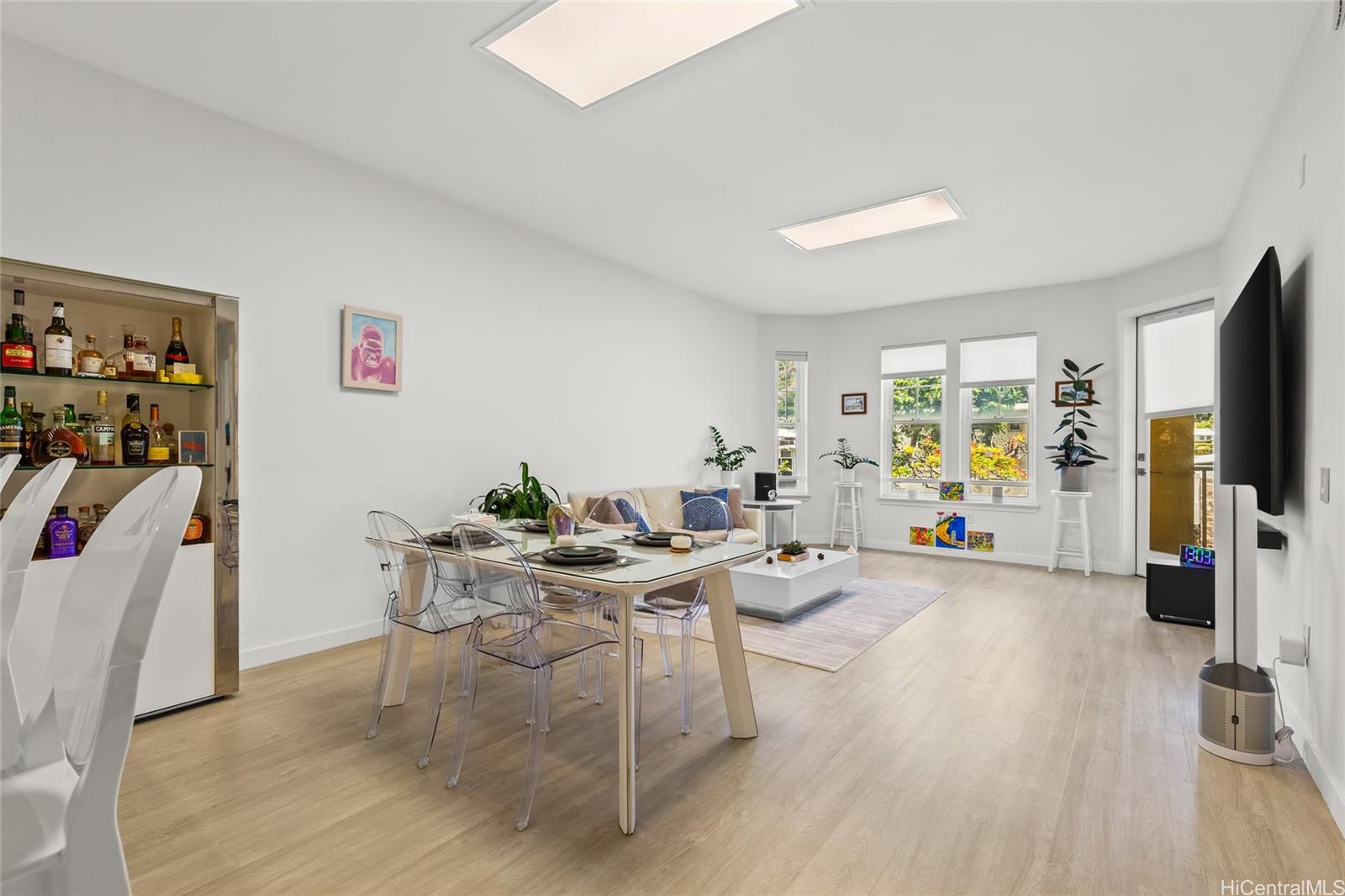 520 Lunalilo Home Road, Unit 8107 Honolulu, HI 96825 - Photo 7 of 25 a view of a livingroom with furniture and a flat screen tv