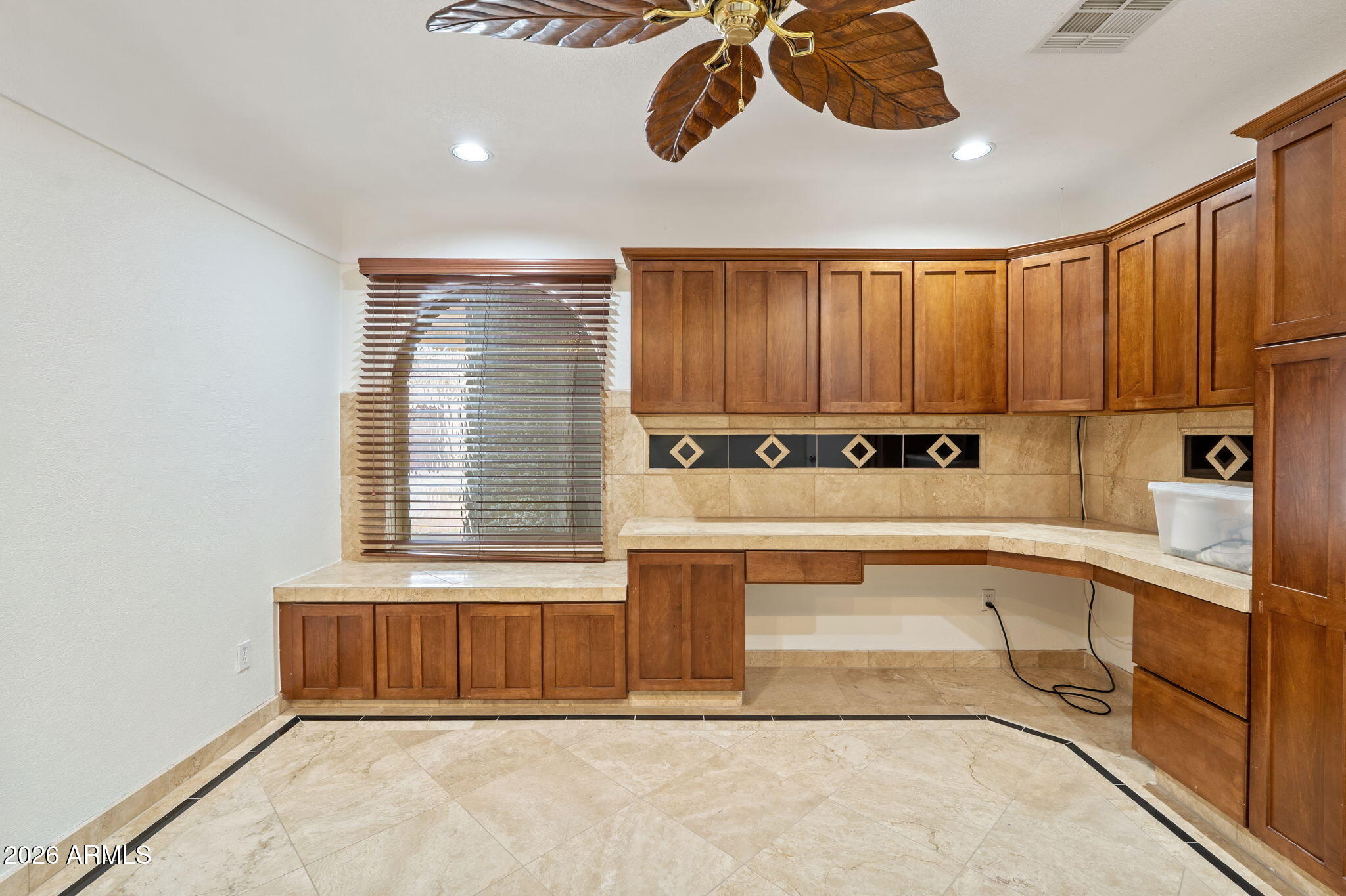 1345 East Ocotillo Road Phoenix, AZ 85014 - Photo 22 of 34 a kitchen with a cabinets and window