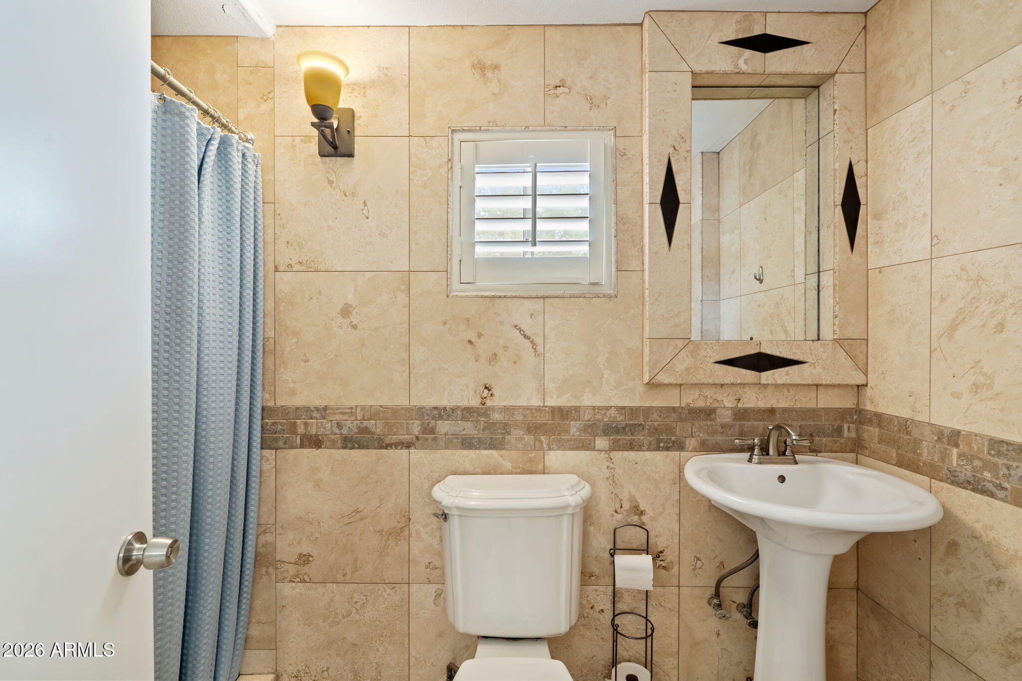 1345 East Ocotillo Road Phoenix, AZ 85014 - Photo 25 of 34 a bathroom with a sink toilet and shower