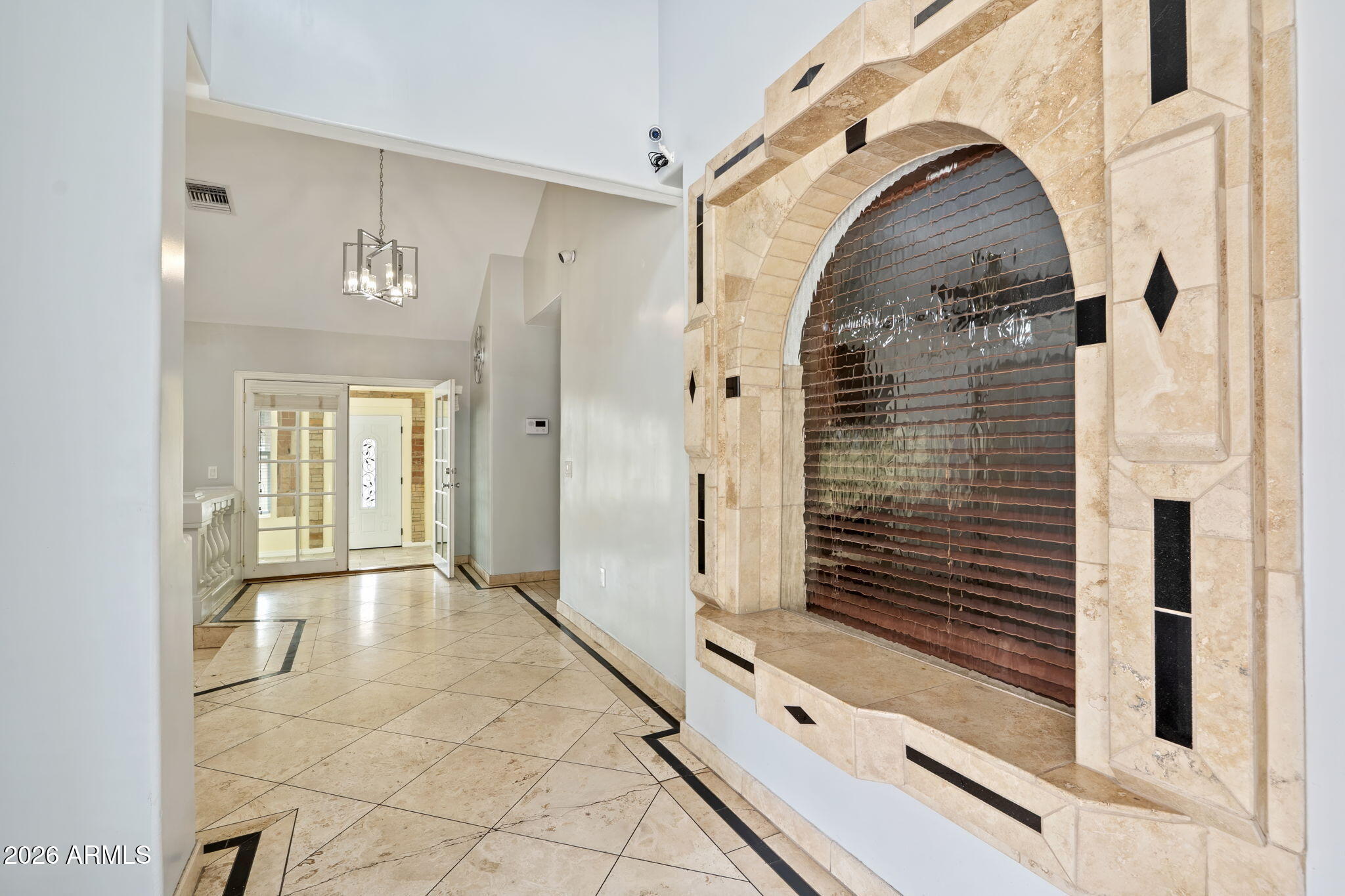 1345 East Ocotillo Road Phoenix, AZ 85014 - Photo 6 of 34 a view of entryway with a front door and wooden floor