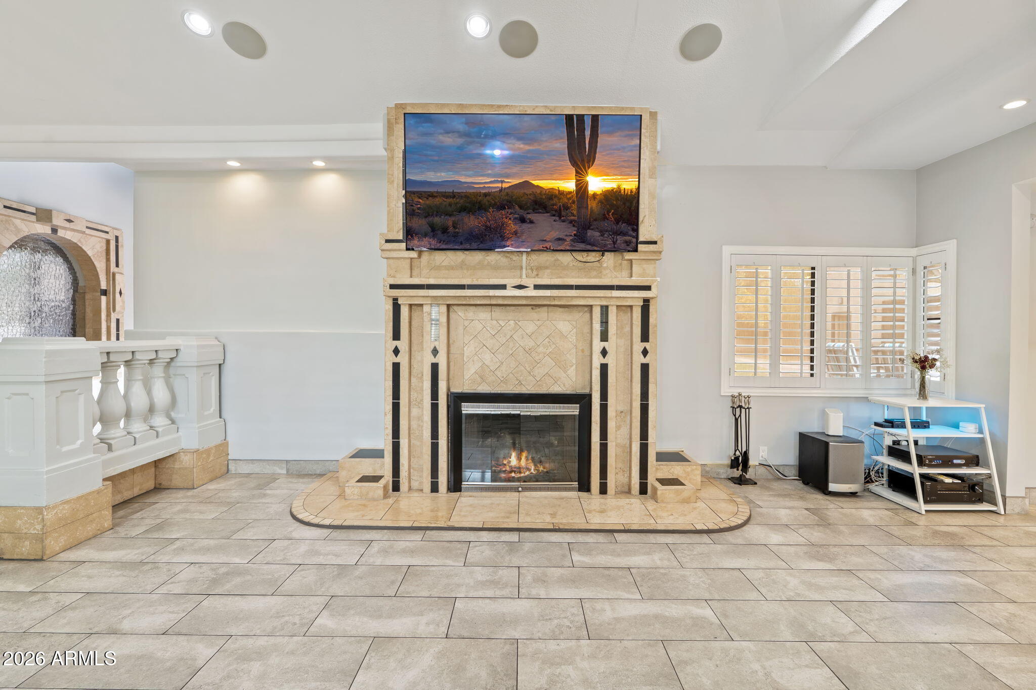1345 East Ocotillo Road Phoenix, AZ 85014 - Photo 9 of 34 a living room with furniture and a fireplace