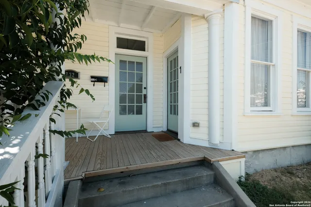a view of backyard with cabin