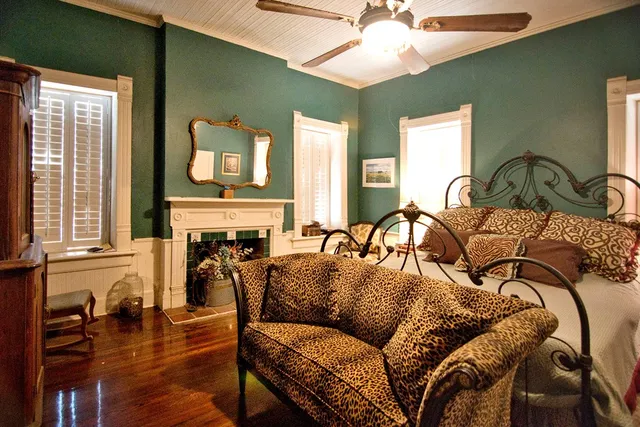 a living room with furniture fireplace and flat screen tv