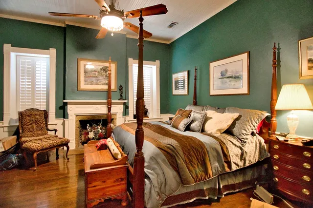 a bed room with a bed and a couch