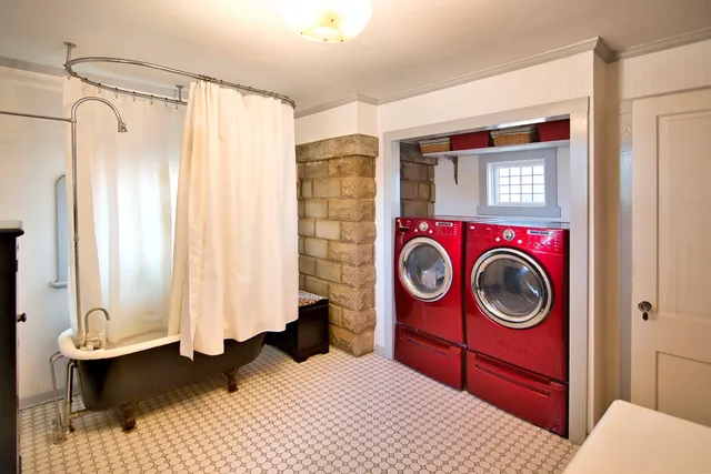 a utility room with dryer and washer