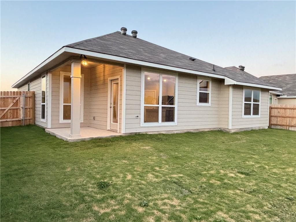 4229 Centerfire Road Waco, TX 76705 - Photo 14 of 14 a view of a house with a backyard