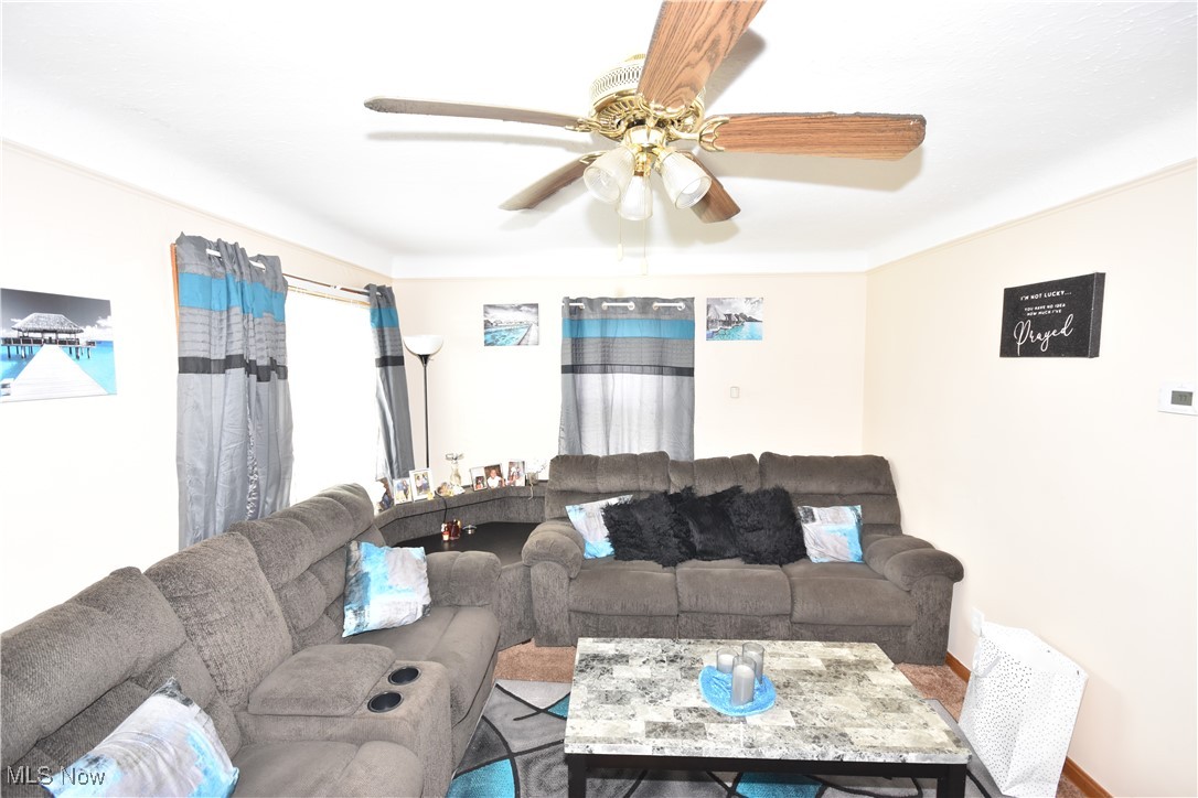 5840 Turney Road Cleveland, OH 44125 - Photo 4 of 21 Living room featuring ceiling fan