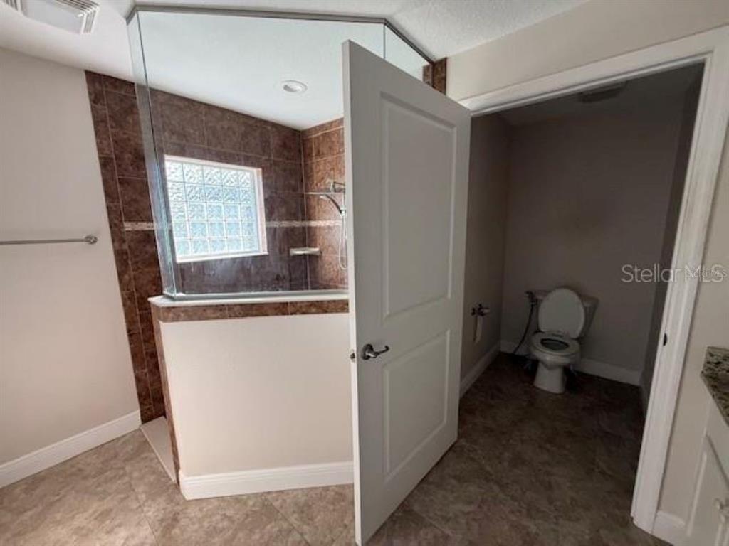 3707 Southeast 24th Street Ocala, FL 34471 - Photo 9 of 14 a bathroom with a sink and a toilet