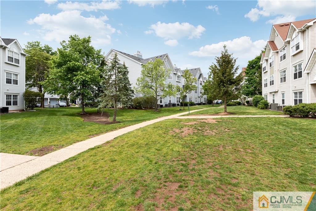 110 Prestwick Way Edison, NJ 08820 - Photo 25 of 26 a view of a park with large trees