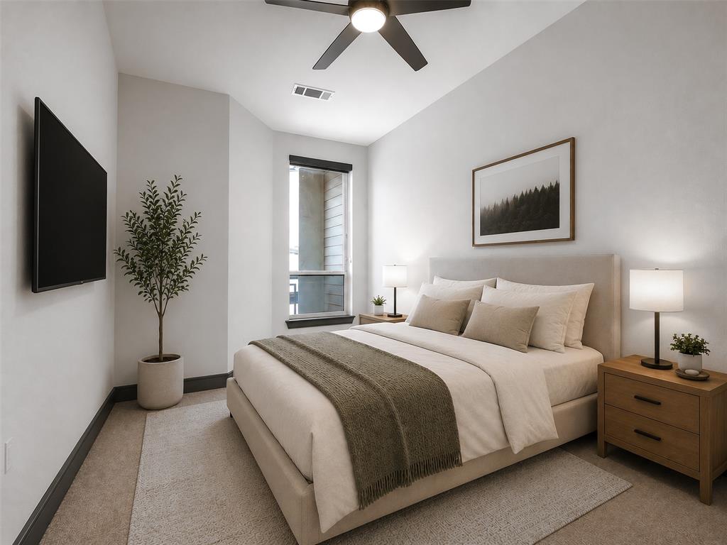 2700 Old Denton Road, Unit 3370 Carrollton, TX 75007 - Photo 16 of 35 a bedroom with a bed and a potted plant