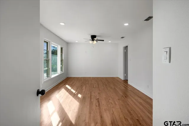 a view of an empty room and window