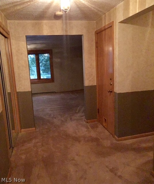 1725 Spring Valley Avenue Northwest Canton, OH 44708 - Photo 13 of 35 Front foyer view leads to very large great room