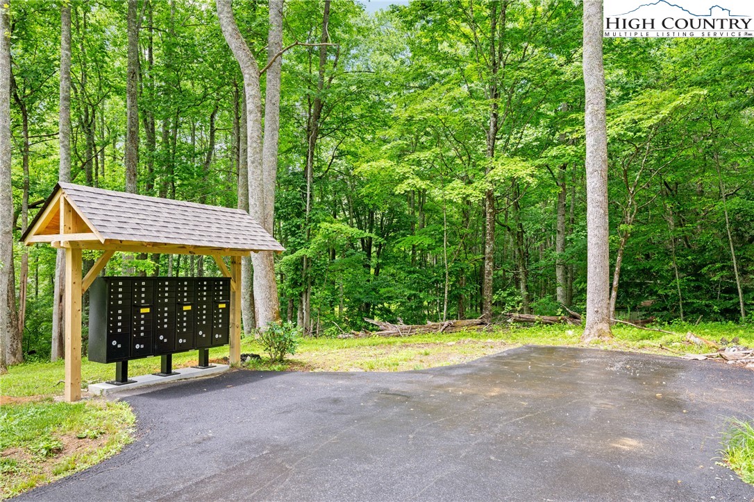 Lot 24 Poplar Forest Drive Boone, NC 28607 - Photo 10 of 15 a view of a house with backyard and garden