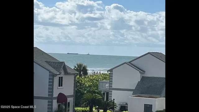 a view of yard with swimming pool and outdoor seating