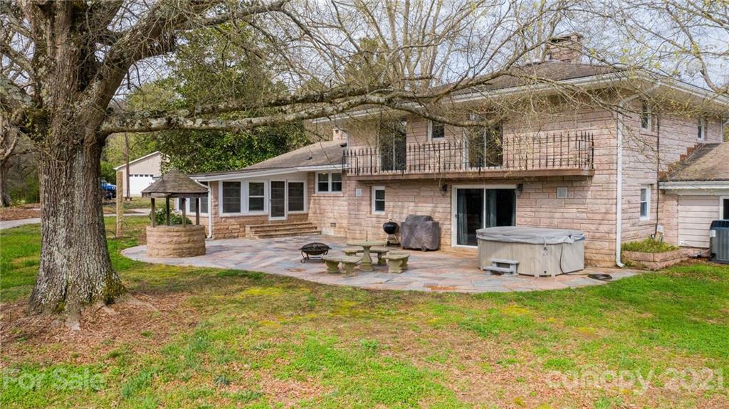 185 Rainey Road Salisbury, NC 28146 - Photo 11 of 47 a view of a house with backyard and sitting area