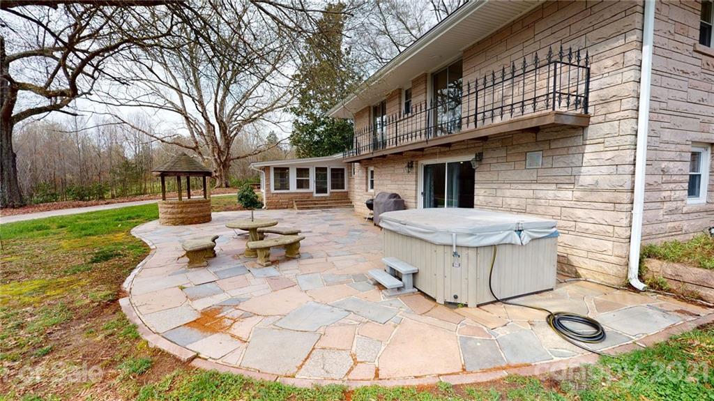 185 Rainey Road Salisbury, NC 28146 - Photo 14 of 47 a view of a backyard with sitting area
