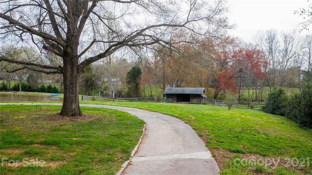 185 Rainey Road Salisbury, NC 28146 - Photo 4 of 47 a view of a park with large trees