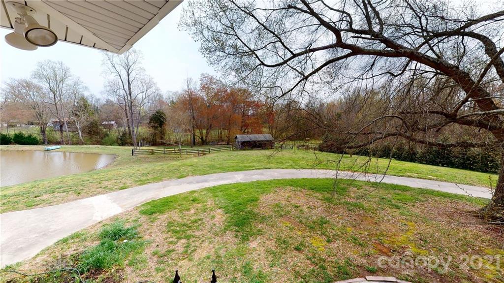 185 Rainey Road Salisbury, NC 28146 - Photo 45 of 47 a view of a backyard with large trees